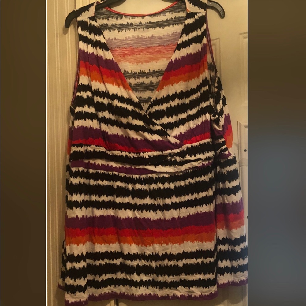 Multi-color sleeveless blouse.
